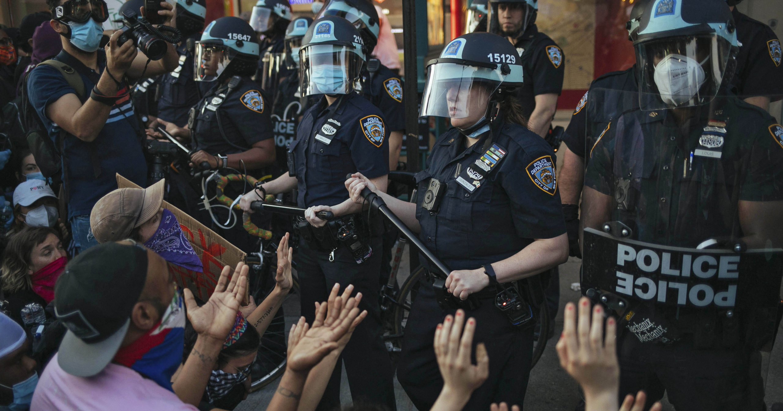 New York City police face off with activists during a protest in the Brooklyn borough of New York on May 31, 2020.