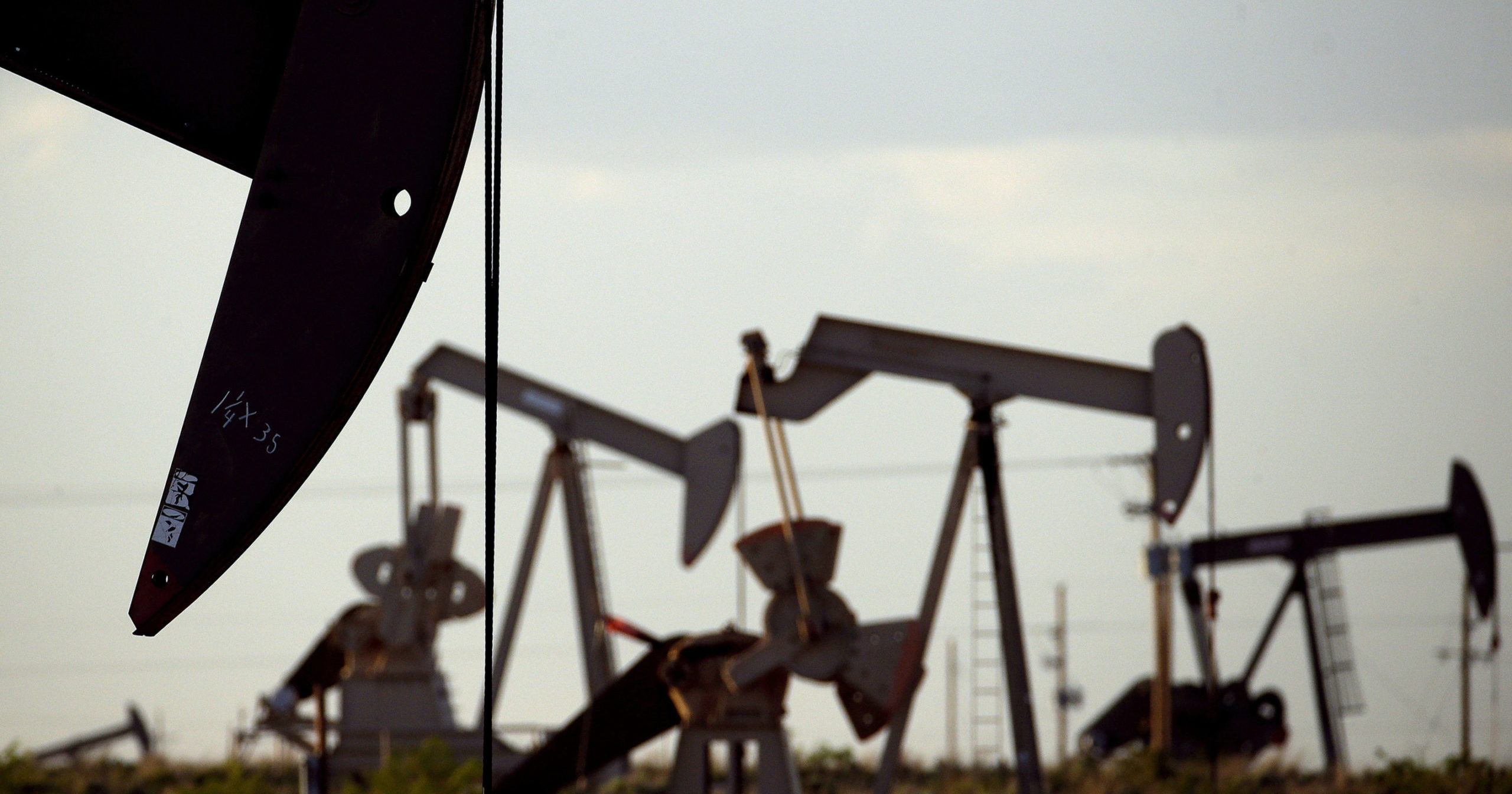 Pumpjacks are seen in a field near Lovington, New Mexico, on April 24, 2015.