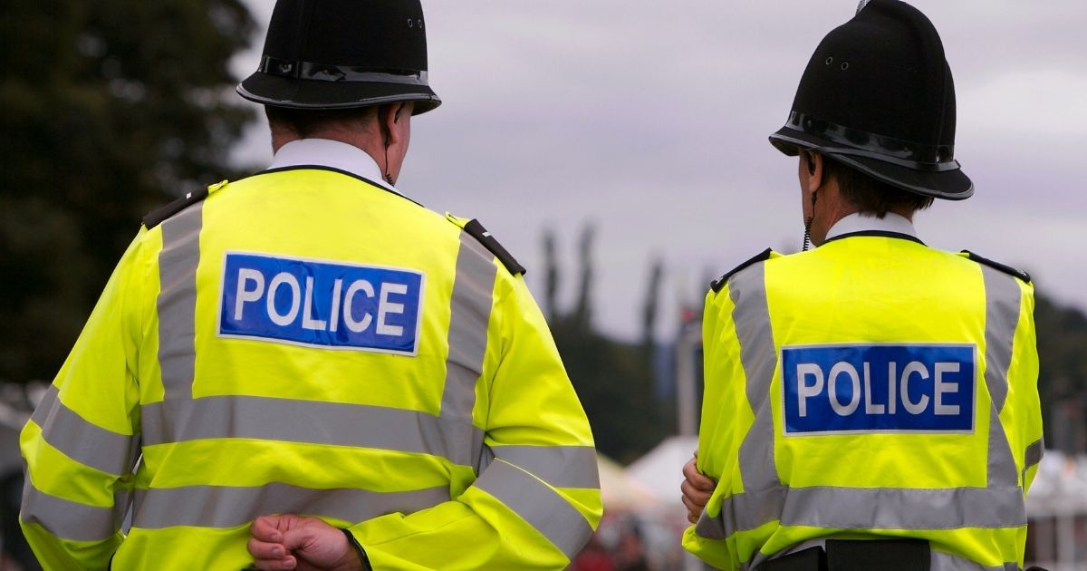 A stock photo of British police officers is seen above.