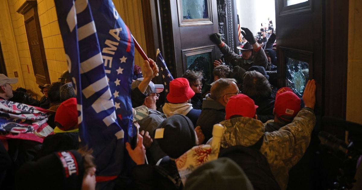Protesters break into the U.S. Capitol in Washington on Wednesday.