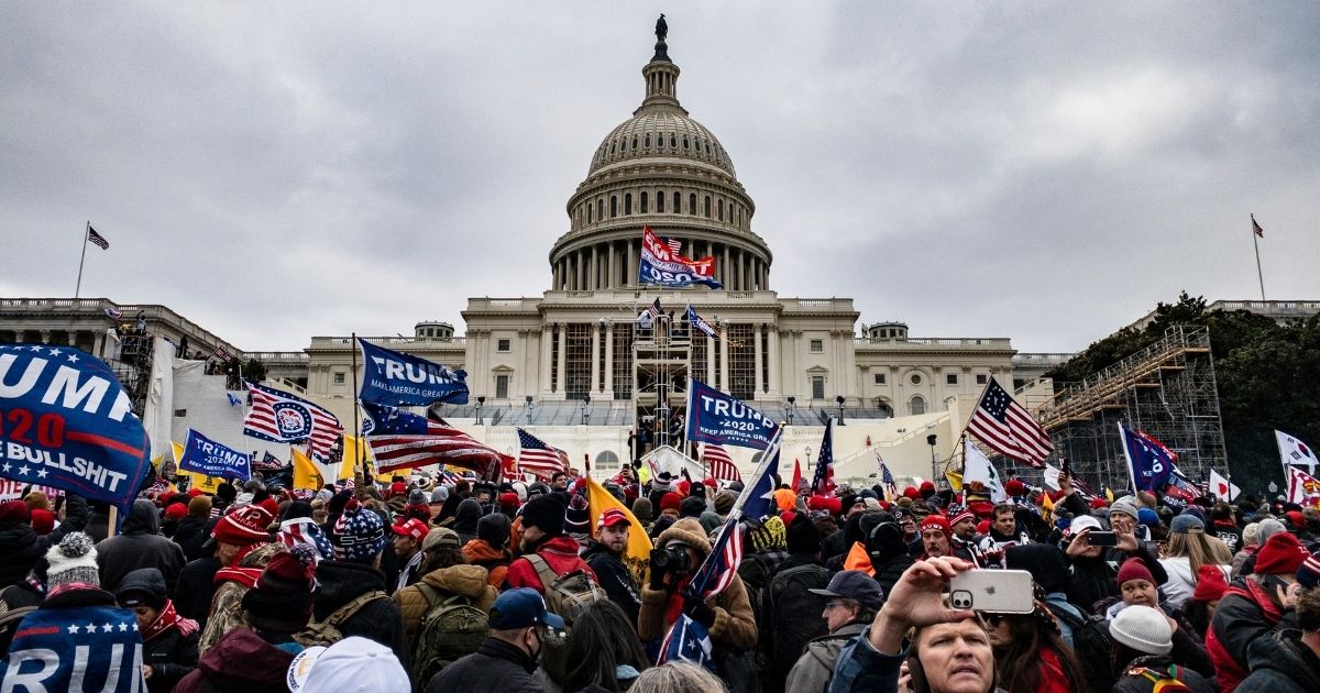 Trump supporters storm the U.S. Capitol following a rally with President Donald Trump on Wednesday in Washington, D.C.