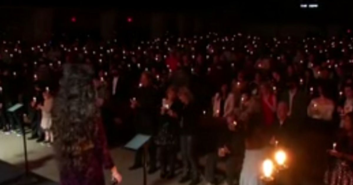 Legacy Church posted a video that showed hundred gathered, with few masks, in a building singing "Silent Night." The video has since been taken down.