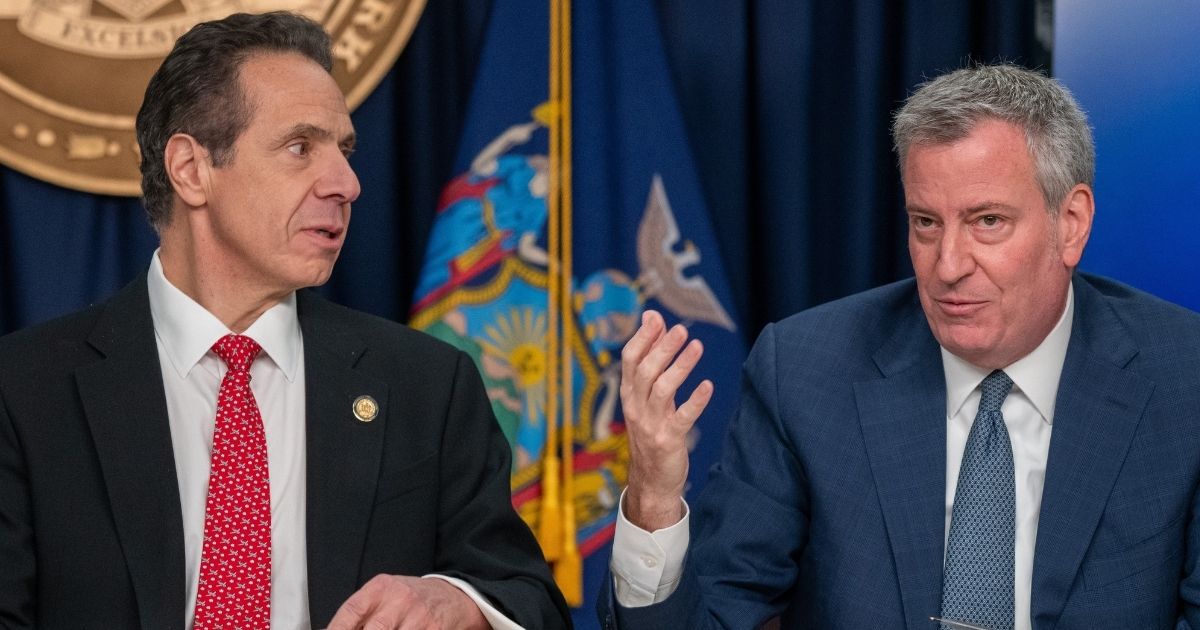 New York Gov. Andrew Cuomo and New York City Mayor Bill de Blasio speak during a news conference March 2 in New York.