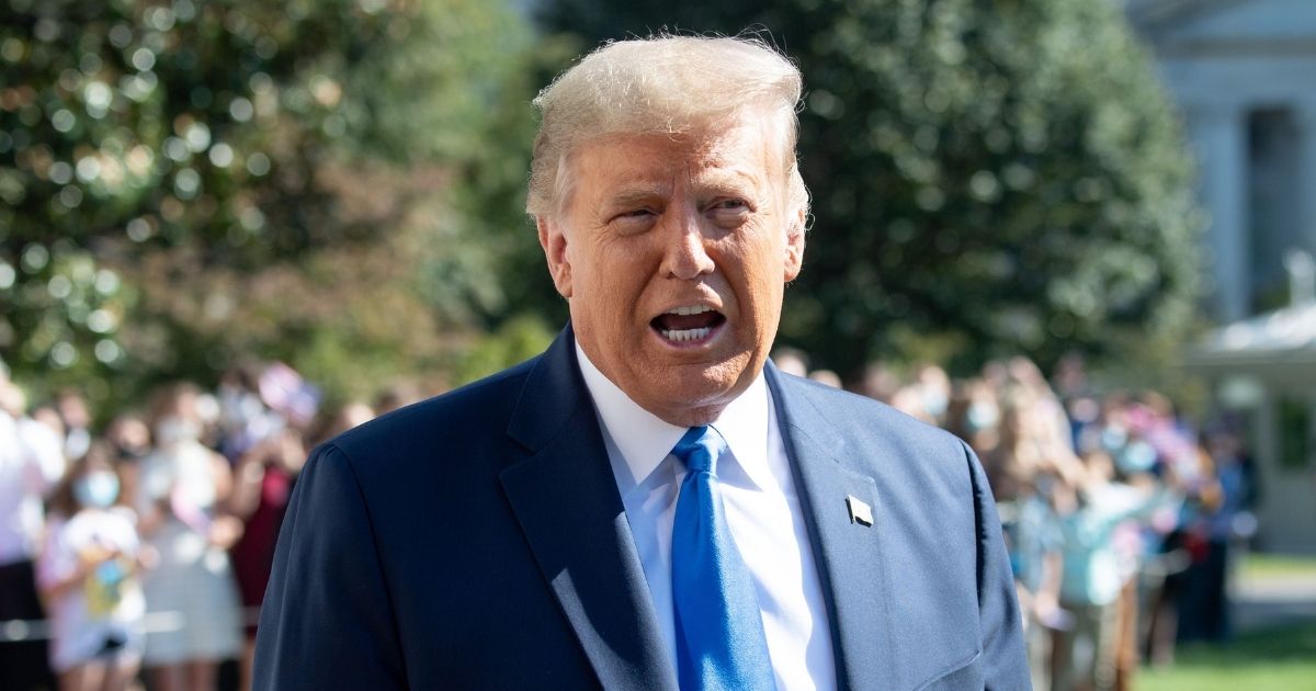 President Donald Trump speaks to the media as he departs the White House in Washington, D.C., on Oct. 15, 2020.