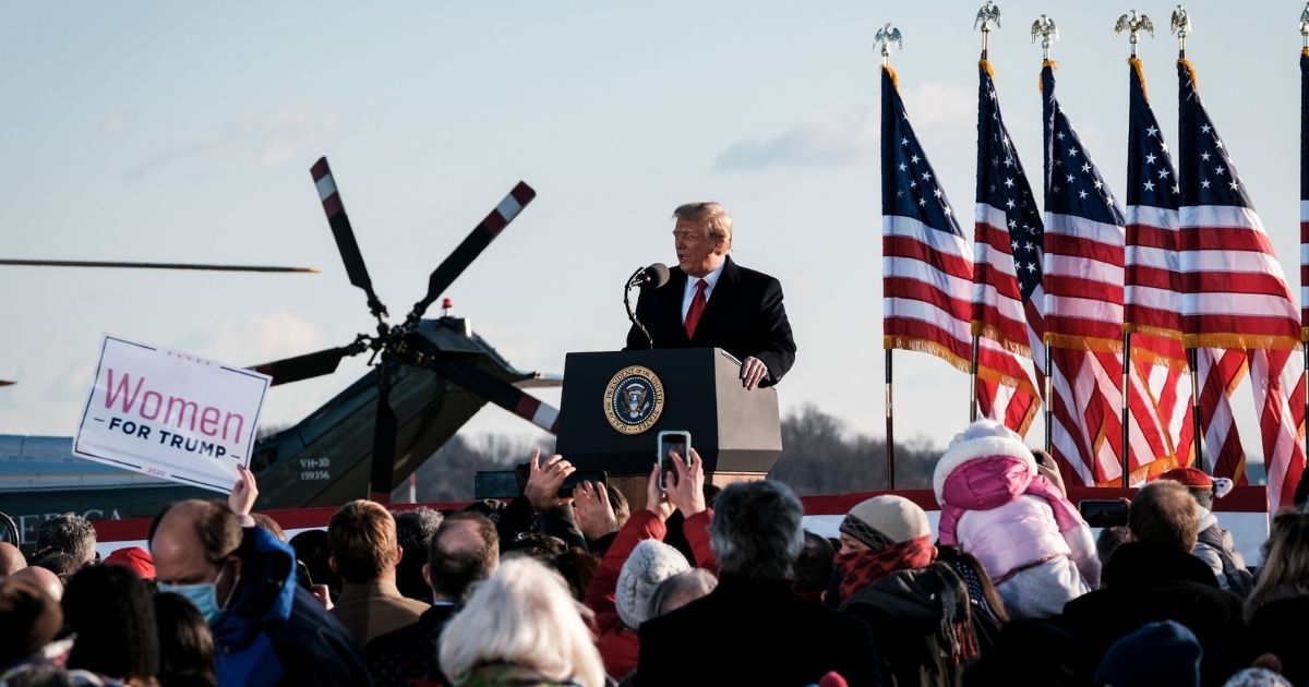President Donald Trump speaks to his supporters prior to boarding Air Force One to head to Florida on Wednesday in Joint Base Andrews, Maryland.