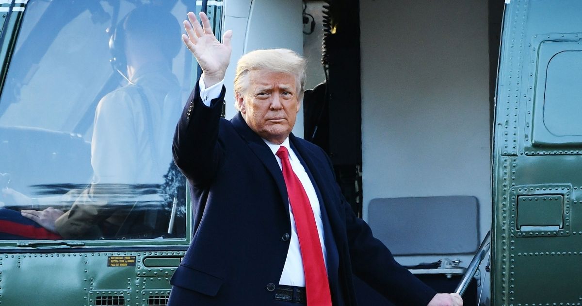 Then-President Donald Trump waves as he boards Marine One at the White House in Washington, D.C., on Wednesday.