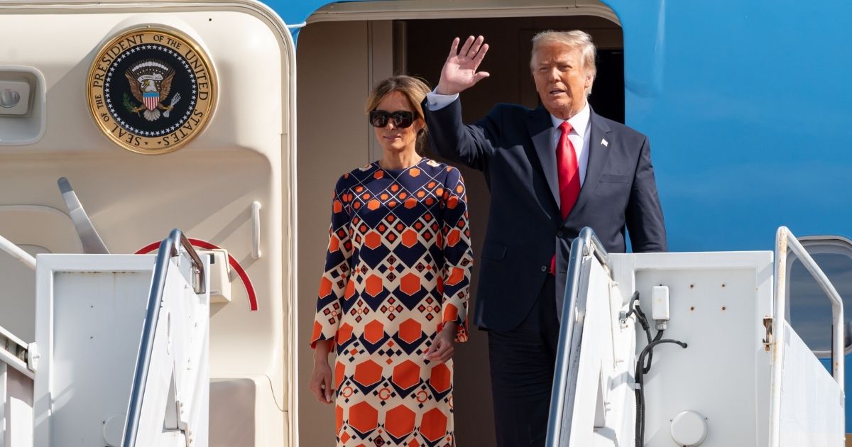 Then-President Donald Trump and then-first lady Melania Trump exit Air Force One at the Palm Beach International Airport on the way to the Mar-a-Lago Club on Wednesday in West Palm Beach, Florida.