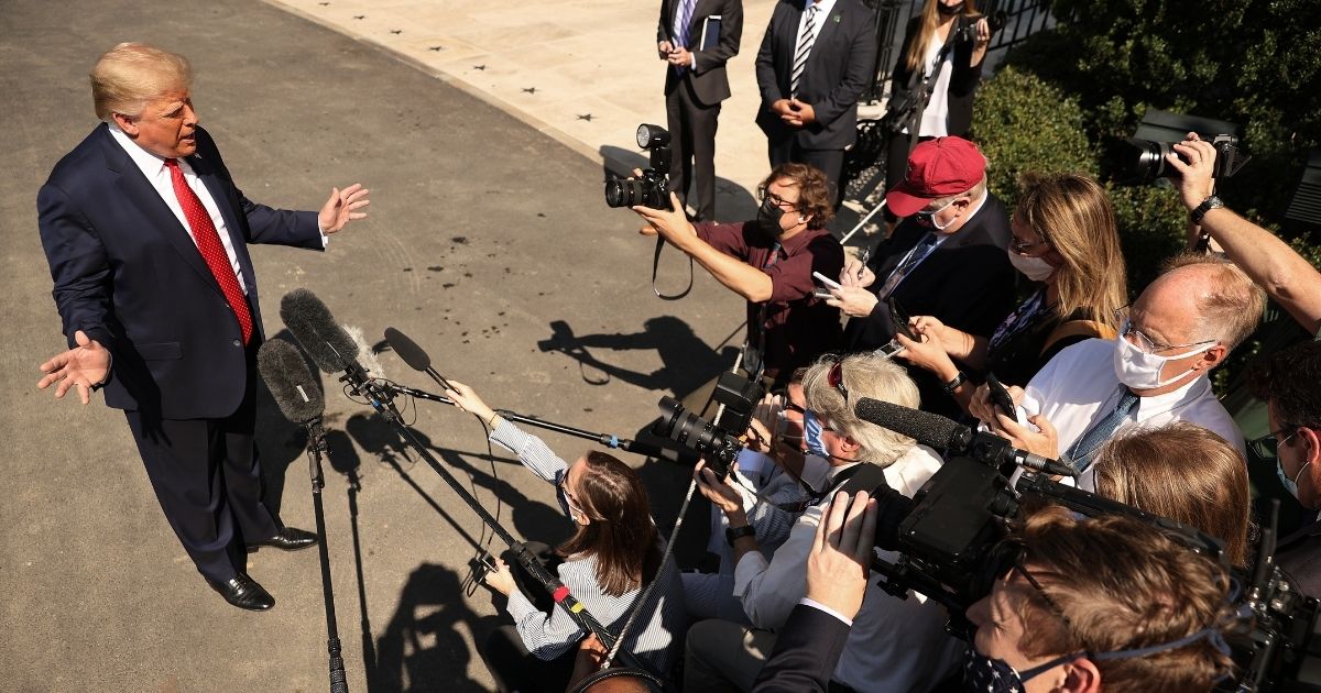 President Donald Trump talks to reporters as he leaves the White House for a trip to Minnesota and Wisconsin on Aug. 17, 2020, in Washington, D.C.