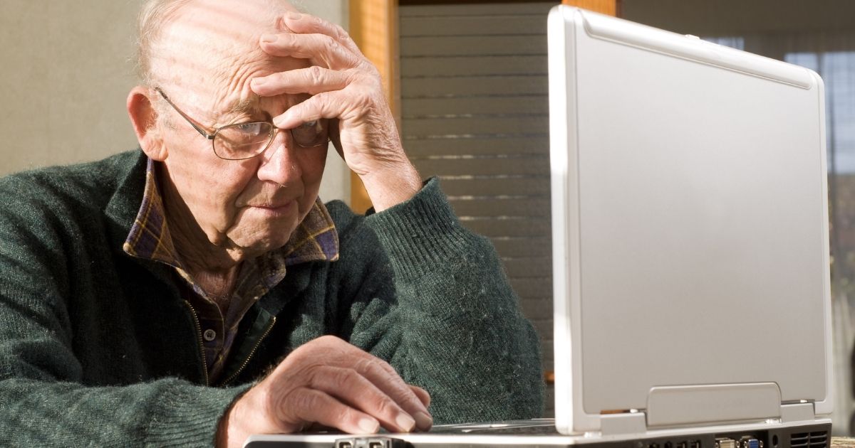 Elderly Man Using Computer
