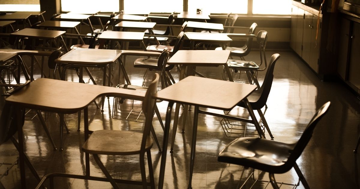This stock photo shows a dark, empty clasroom. Suicide rates among adolescents have gone up in the Clark County School District in Nevada, due to school closures.