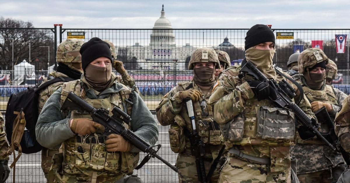 Members of the National Guard patrol the National Mall in Washington on Tuesday.