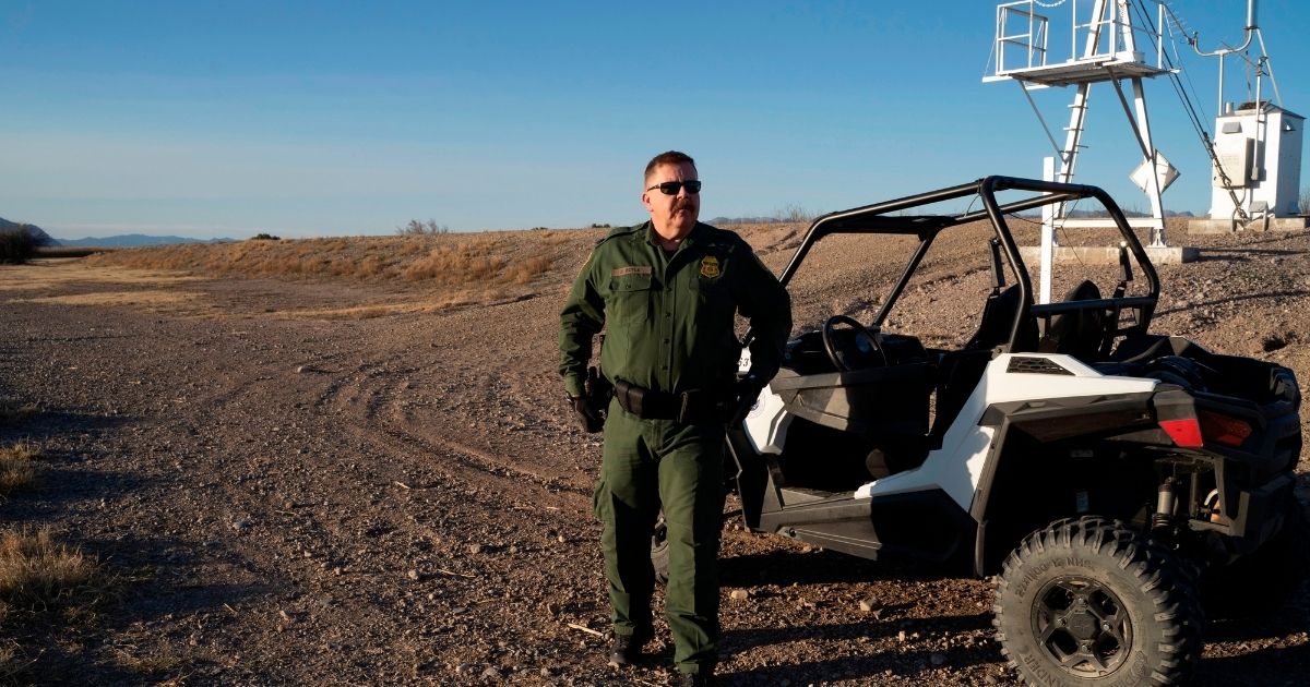 Border Patrol Presidio Station Agent in Charge Derek Boyle stands by an all terrain vehicle as he rides along the US-Mexico Border on Jan. 29, 2020, in Presidio, Texas.