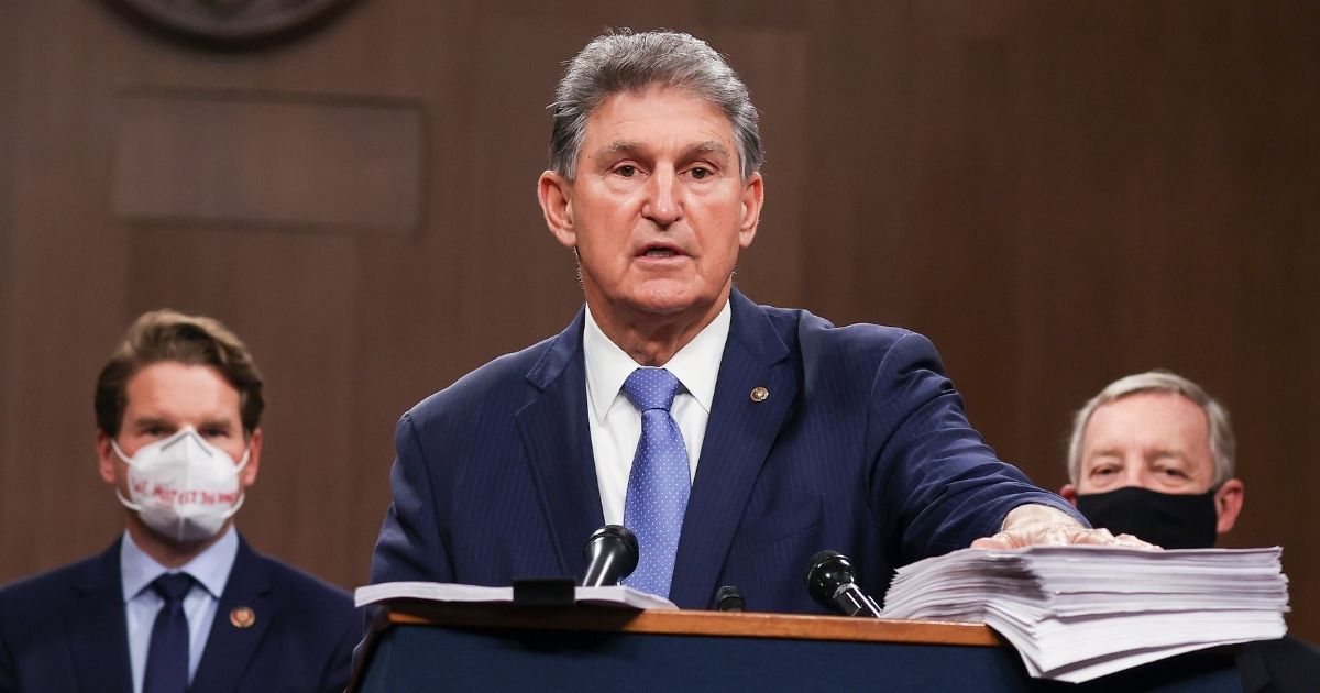 West Virginia Democratic Sen. Joe Manchin speaks alongside a bipartisan group of Democrat and Republican members of Congress as they announce a proposal for a COVID-19 relief bill on Capitol Hill on Dec. 14, 2020, in Washington, D.C.