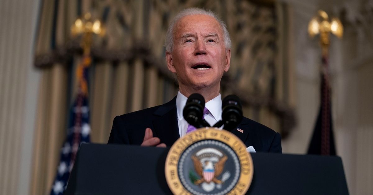 President Joe Biden speaks in the State Dining Room of the White House on Tuesday in Washington, D.C.