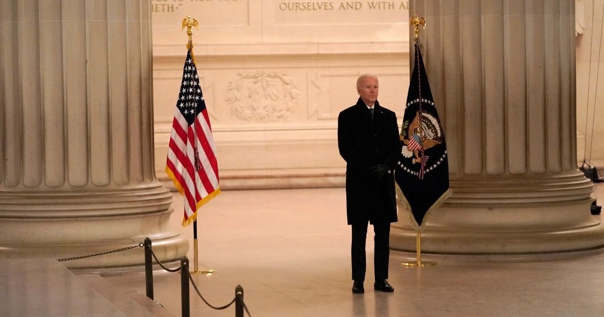 Maskless President Joe Biden participates in a televised ceremony at the Lincoln Memorial in Washington on Wednesday