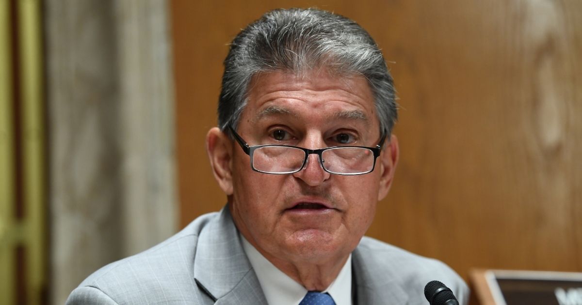 Democratic West Virginia Sen. Joe Manchin questions Ajit Pai, chairman of the Federal Communications Commission, during his testimony before an oversight hearing on June 16, 2020, in Washington, D.C.