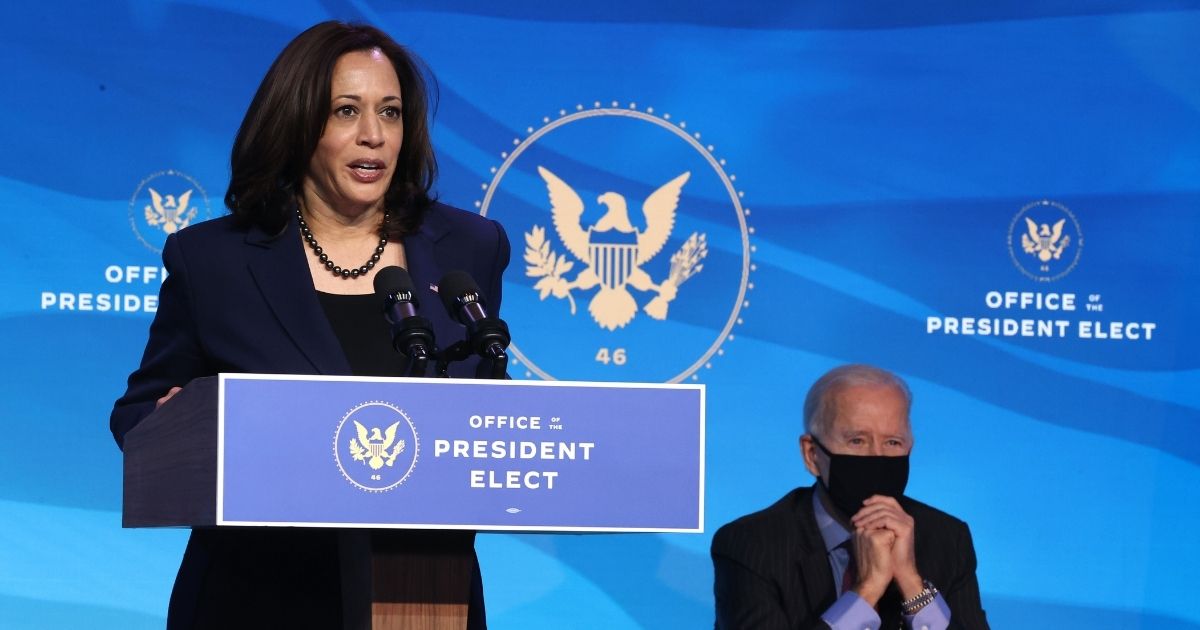 Vice President-elect Kamala Harris, left, delivers remarks after President-elect Joe Biden announced members of his Cabinet that will round out his economic team, including secretaries of commerce and labor, at The Queen theater on Friday in Wilmington, Delaware.