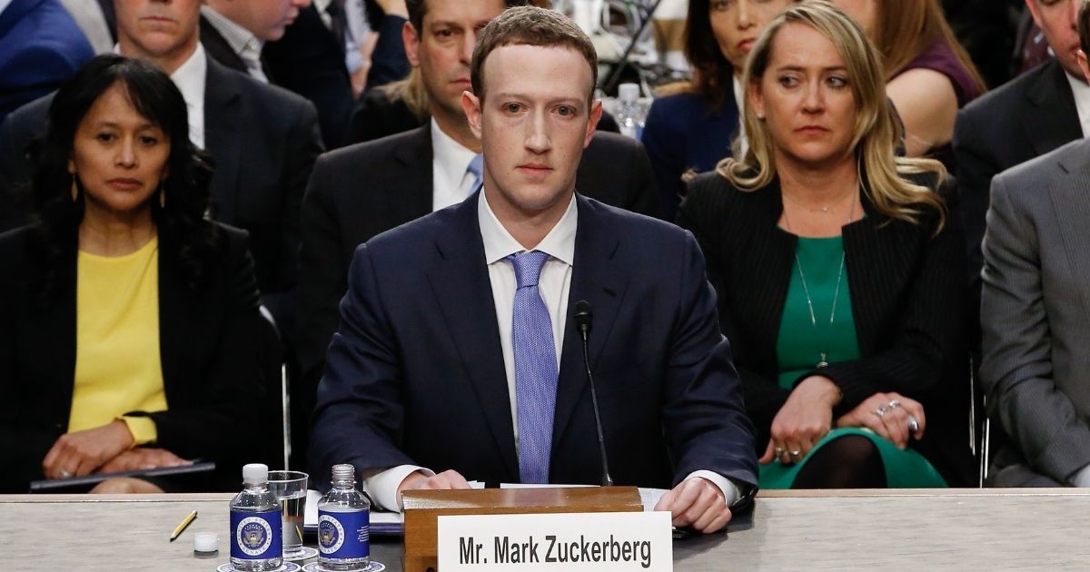 Facebook founder and CEO Mark Zuckerberg arrives to testify during a Senate Commerce, Science and Transportation Committee and Senate Judiciary Committee joint hearing about Facebook on Capitol Hill in Washington, D.C., on April 10, 2018.