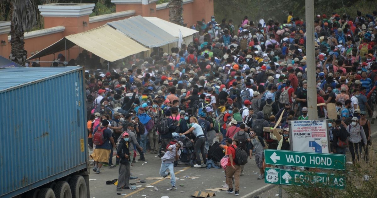 Migrants who arrived in a caravan from Honduras on their way to the United States are dispersed by security forces in Vado Hondo, Guatemala, on Monday.