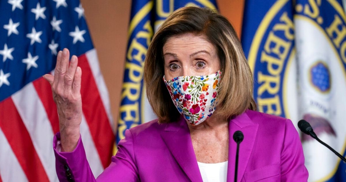 Speaker of the House Nancy Pelosi holds a news conference on the day after violent protesters loyal to President Donald Trump stormed the U.S. Congress, at the Capitol in Washington D.C. on Thursday.