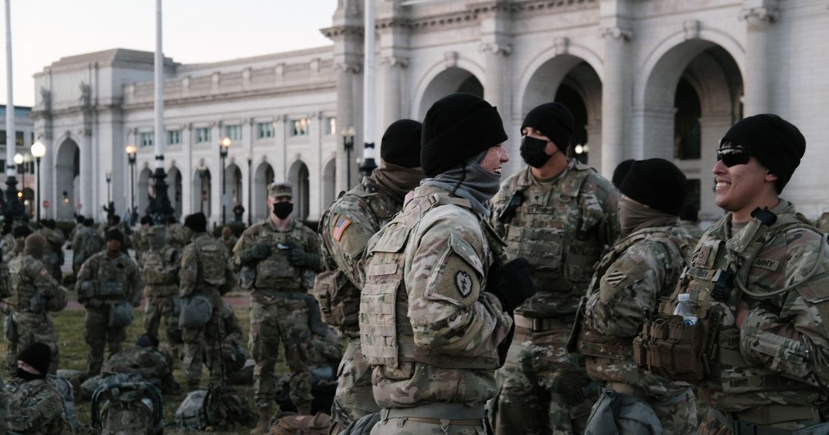 Members of the National Guard wait to depart Union Station as the city remains under tight security during the presidential inauguration in Washington, D.C., on Wednesday.