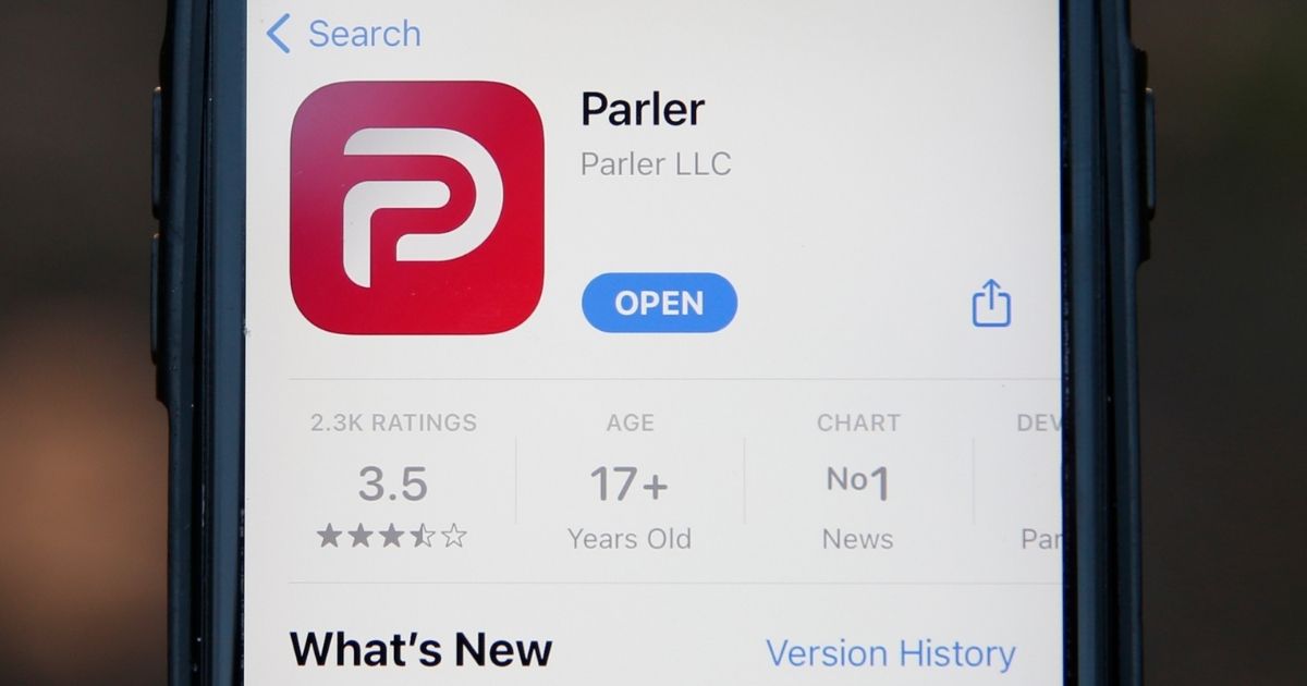 A general view of the Parler social media app is displayed on an iPhone in London on Jan. 9.