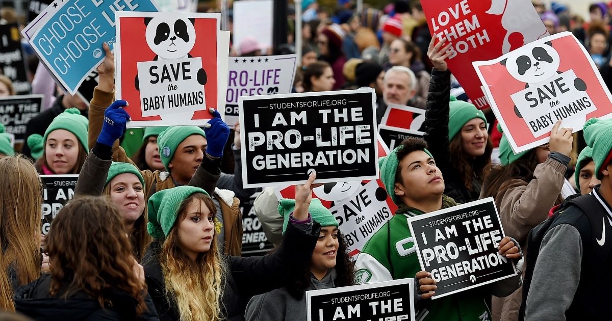 Pro-life activists demonstrate in front of the U.S. Supreme Court during the 47th annual March for Life in Washington on Jan. 24.