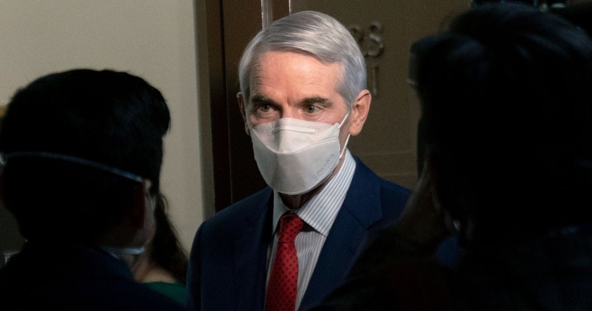 Republican Sen. Rob Portman of Ohio speaks to members of the media outside a Senate Finance Committee hearing on Capitol Hill in Washington, D.C., on Jan. 19, 2021.