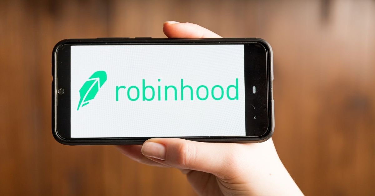 The Robinhood app is pictured on a smartphone in the stock image above.