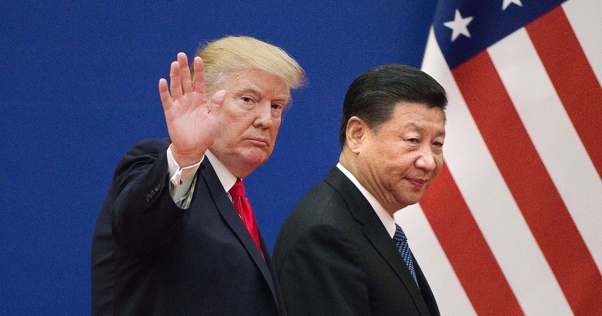 President Donald Trump and Chinese President Xi Jinping are pictured in a file photo from Trump's visit to Beijing in 2017.