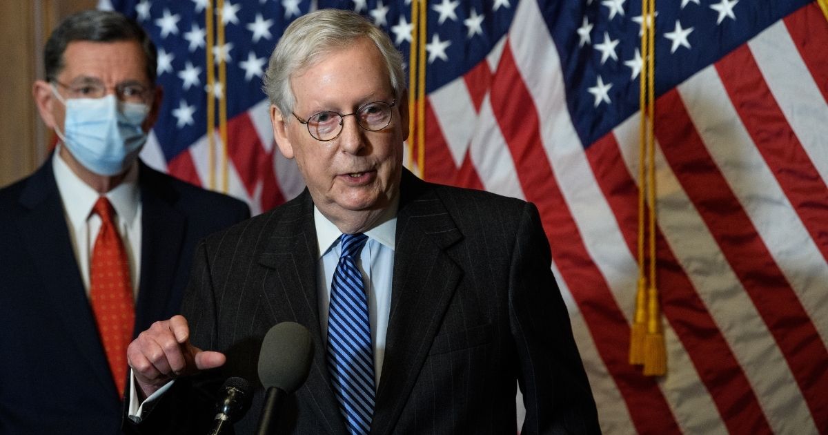 Senate Majority Leader Mitch McConnell, pictured in a file photo from December, is not going along with a plan to reconvene the Senate to conduct an impeachment trial of President Donald Trump before Trump leaves office.