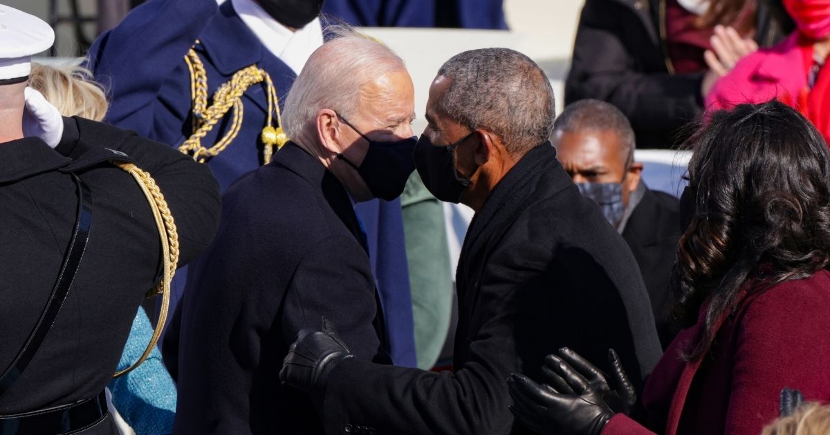 Newly inaugurated President Joe Biden greets formerPresident Barack Obama Wednesday in Washingtion.