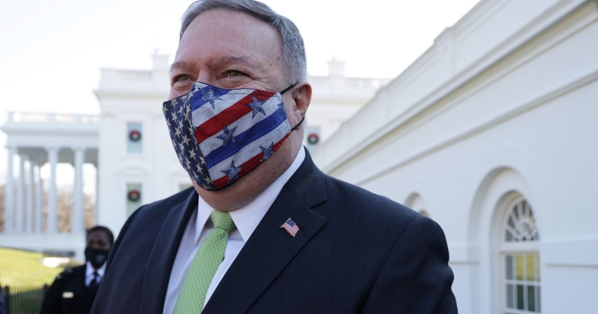 Then-Secretary of State Mike Pompeo walks on the White House grounds on Dec. 11, 2020, as he gives a tour to his family. Pompeo has been blasted by the left for his tweet about multiculturalism.