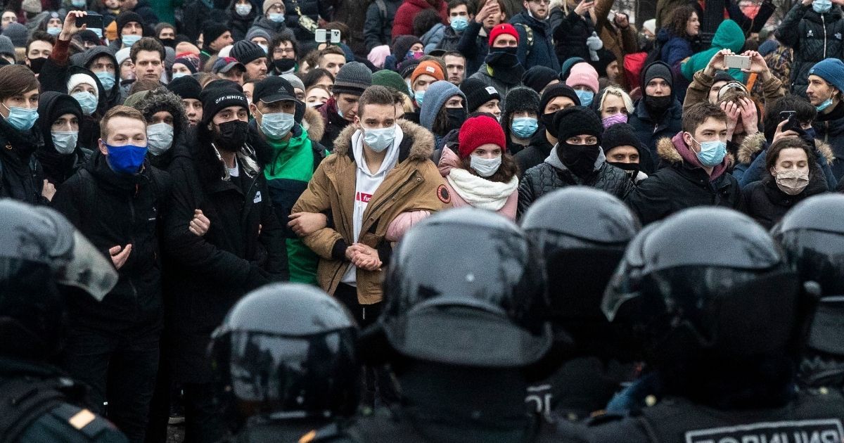 Protesters face off with police in Moscow on Saturday as demonstrations roiled the country over the jailing of opposition leader Alexei Navalny.