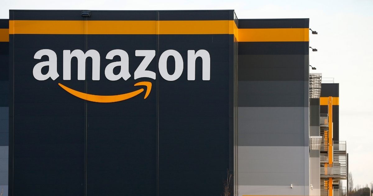 The logo of Amazon is seen on the facade of a building on Nov. 20, 2020, in Bretigny-sur-Orge near Paris.