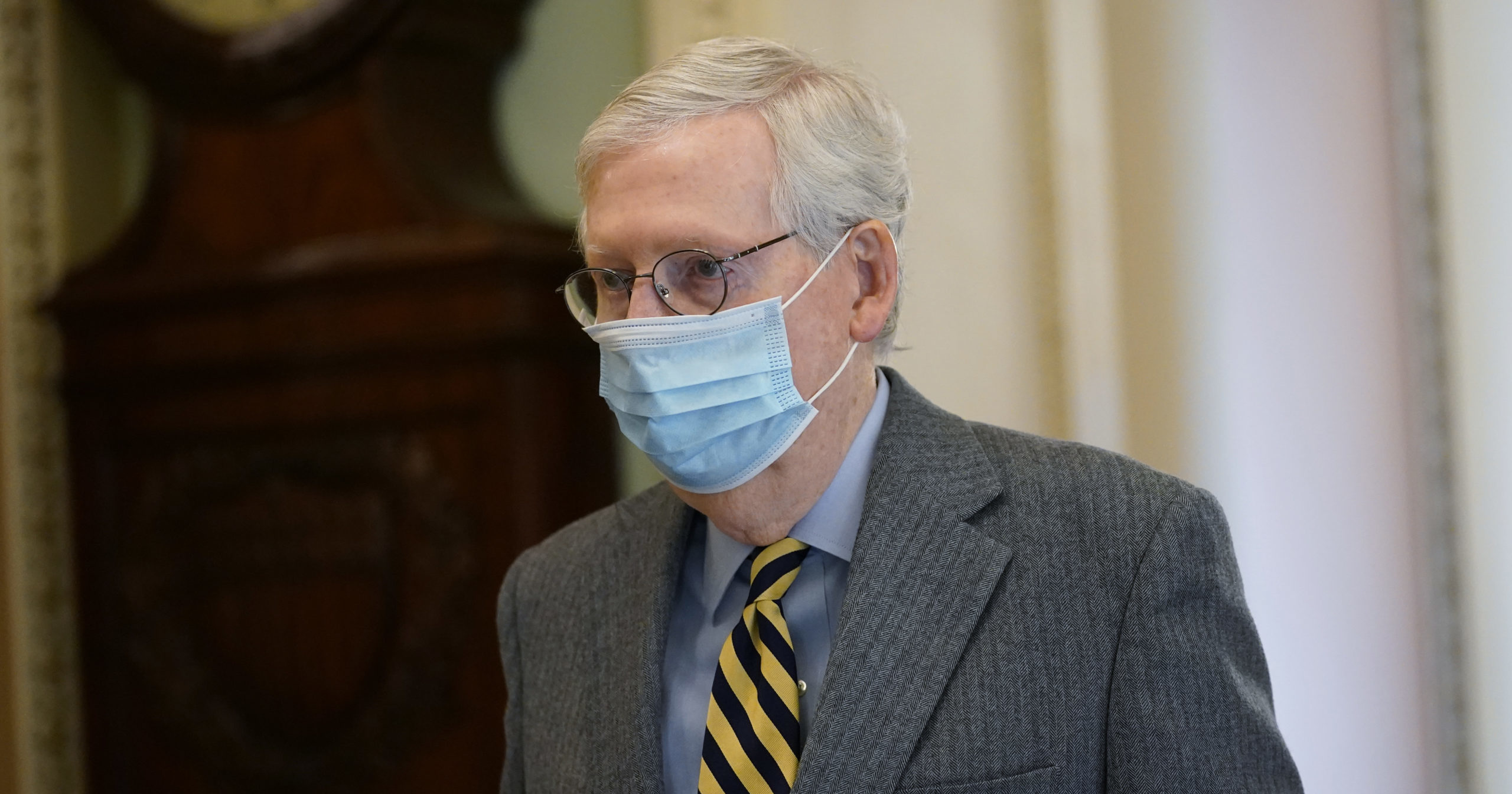 Senate Majority Leader Mitch McConnell walks to the Senate floor on Capitol Hill in Washington, D.C., on Dec. 30, 2020.