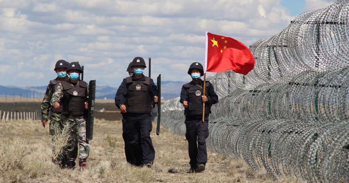Immigration control police patrol no-man's land on Aug. 23, 2020, in Altay, Xinjiang, China.