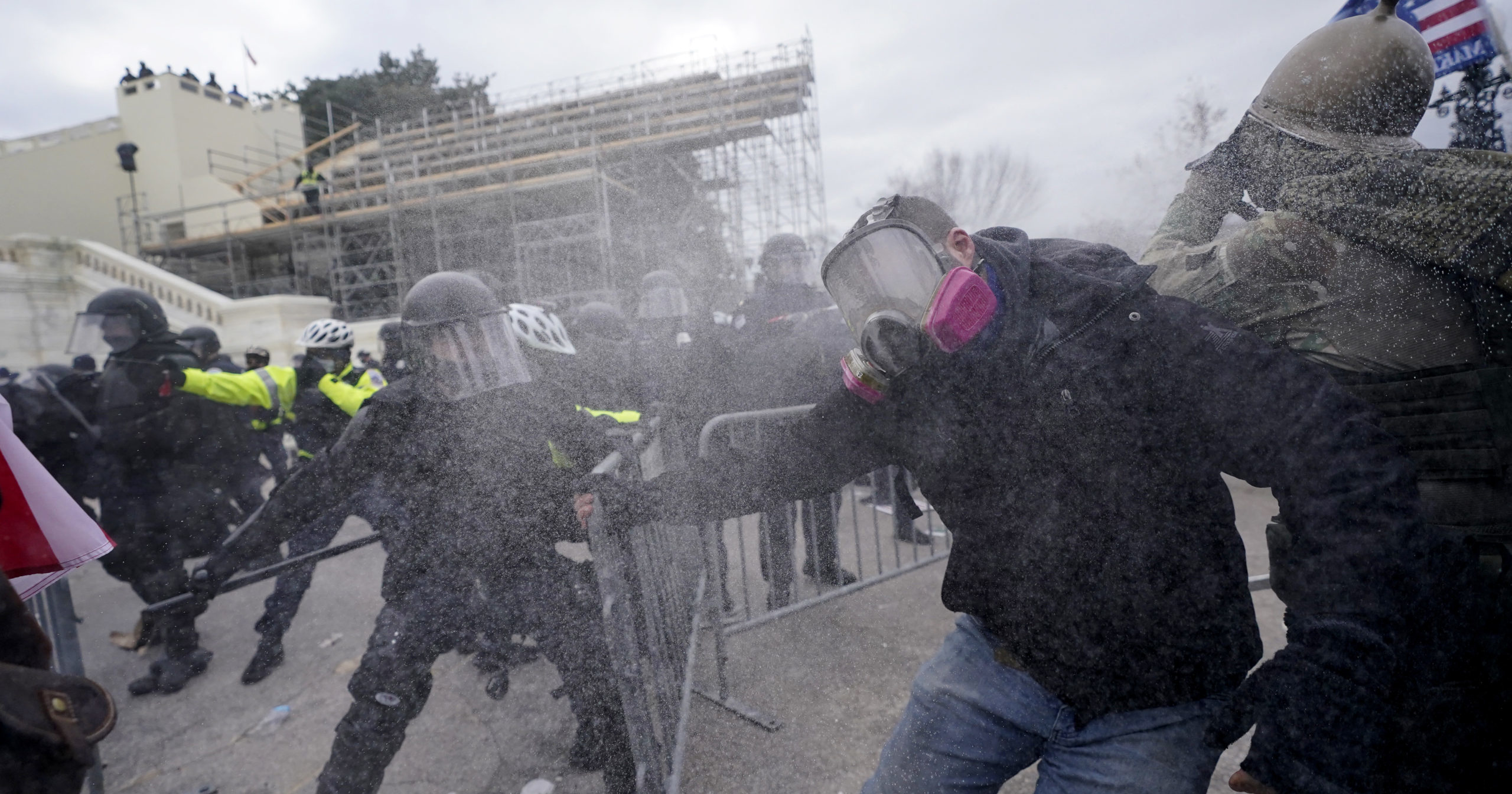Trump supporters try to break through a police barrier on Jan. 6, 2021, at the Capitol in Washington.