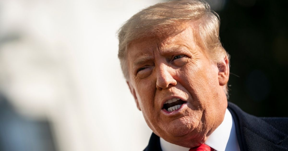 President Donald Trump speaks to reporters on the South Lawn of the White House before boarding Marine One on Jan. 12, 2021, in Washington, D.C.