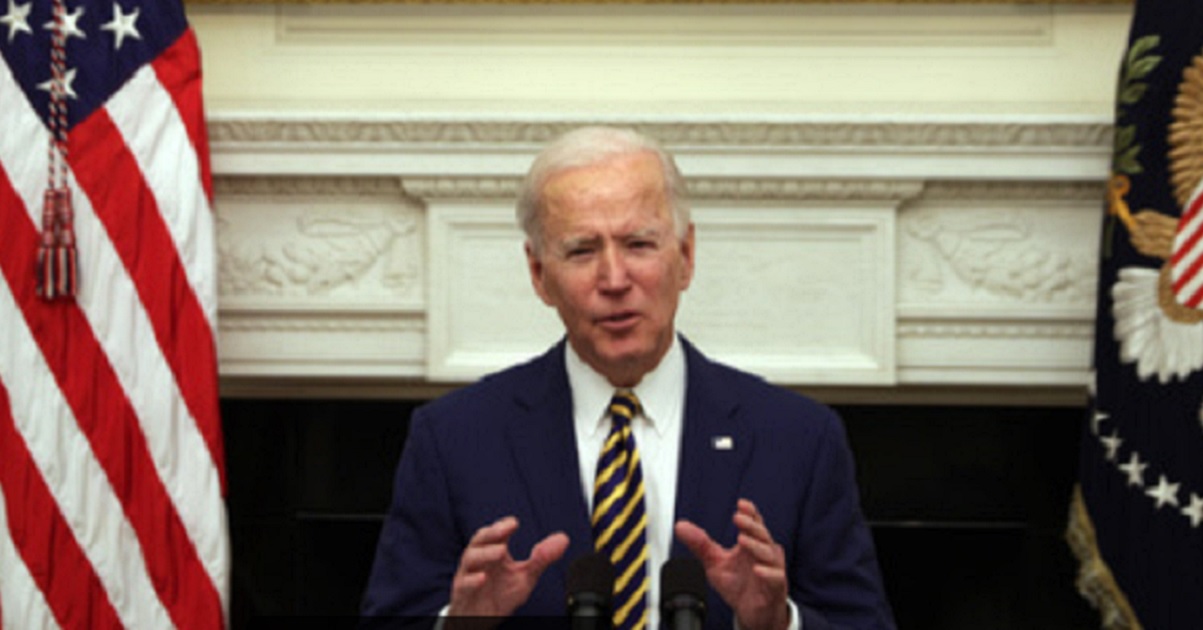 President Joe Biden speaks Friday in the State Dining Room of the White House.