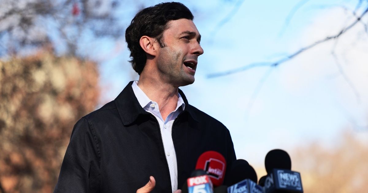 Jon Ossoff speaks with members of the media at Dunbar Neighborhood Center on Jan. 5, 2021, in Atlanta, Georgia.