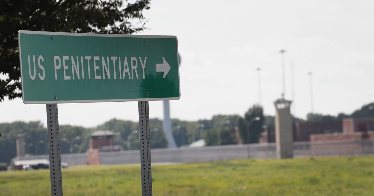 A sign points to the entrance of the Federal Correctional Complex Terre Haute on July 25, 2019, in Terre Haute, Indiana.