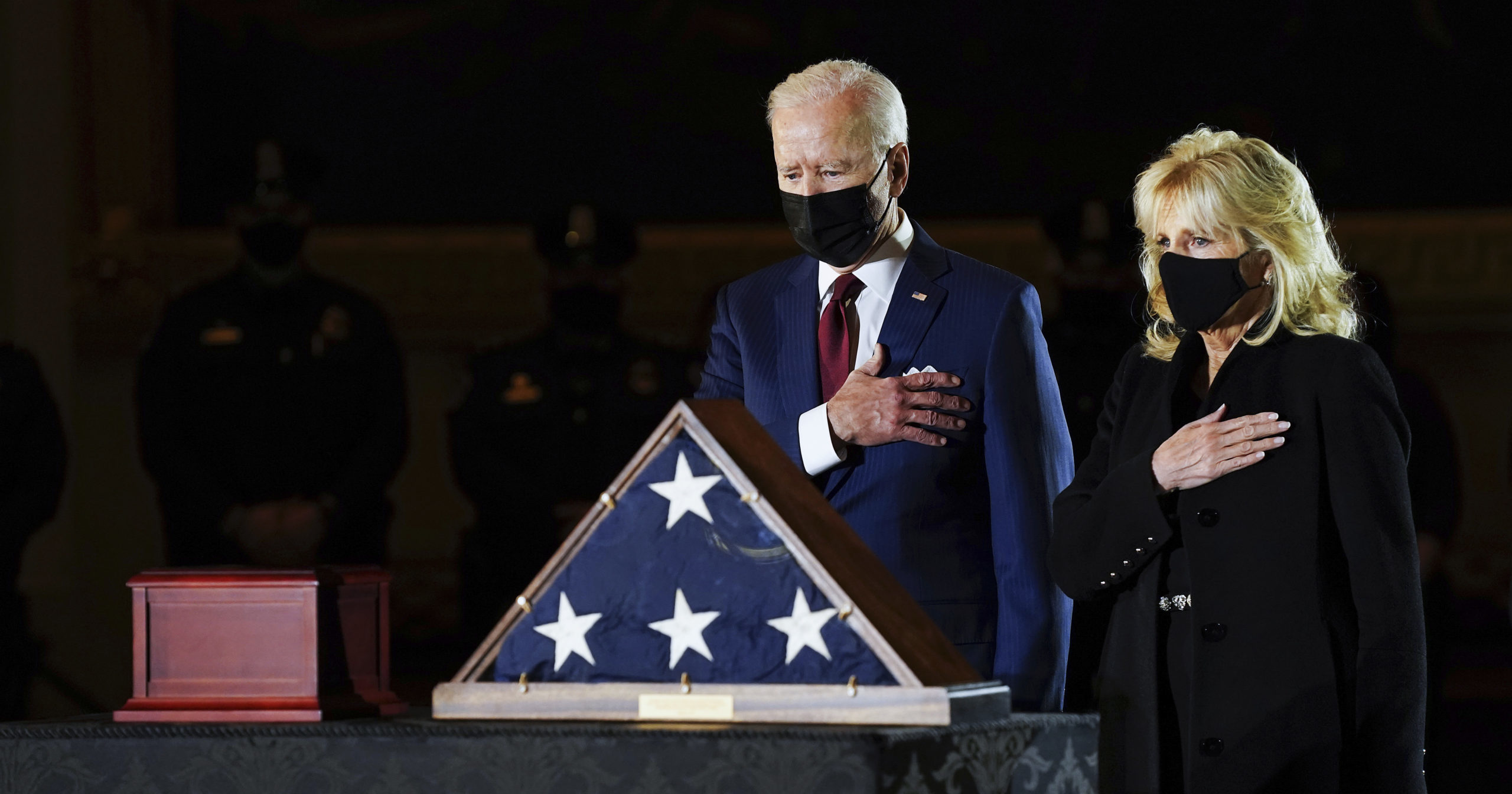 President Joe Biden and first lady Jill Biden pay their respects to the late US Capitol police officer Brian Sicknick at the Capitol Rotunda on Feb. 2, 2021, in Washington, D.C.