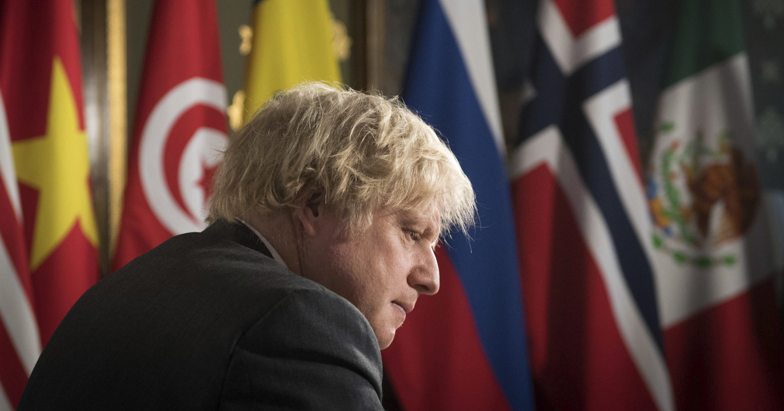 British Prime Minister Boris Johnson chairs a session of the UN Security Council at the Foreign, Commonwealth and Development Office in London on Feb. 23, 2021.