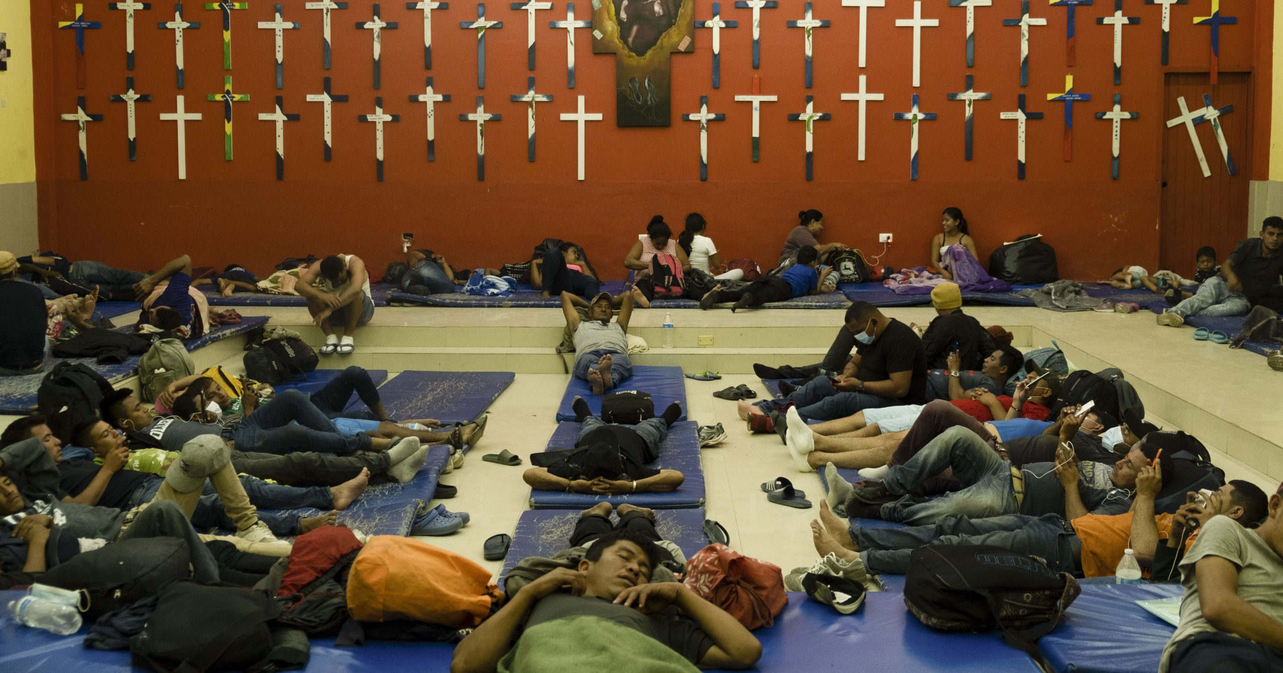 Central American migrants rest at a shelter in Tenosique, Tabasco state, Mexico, on Feb. 9, 2021.