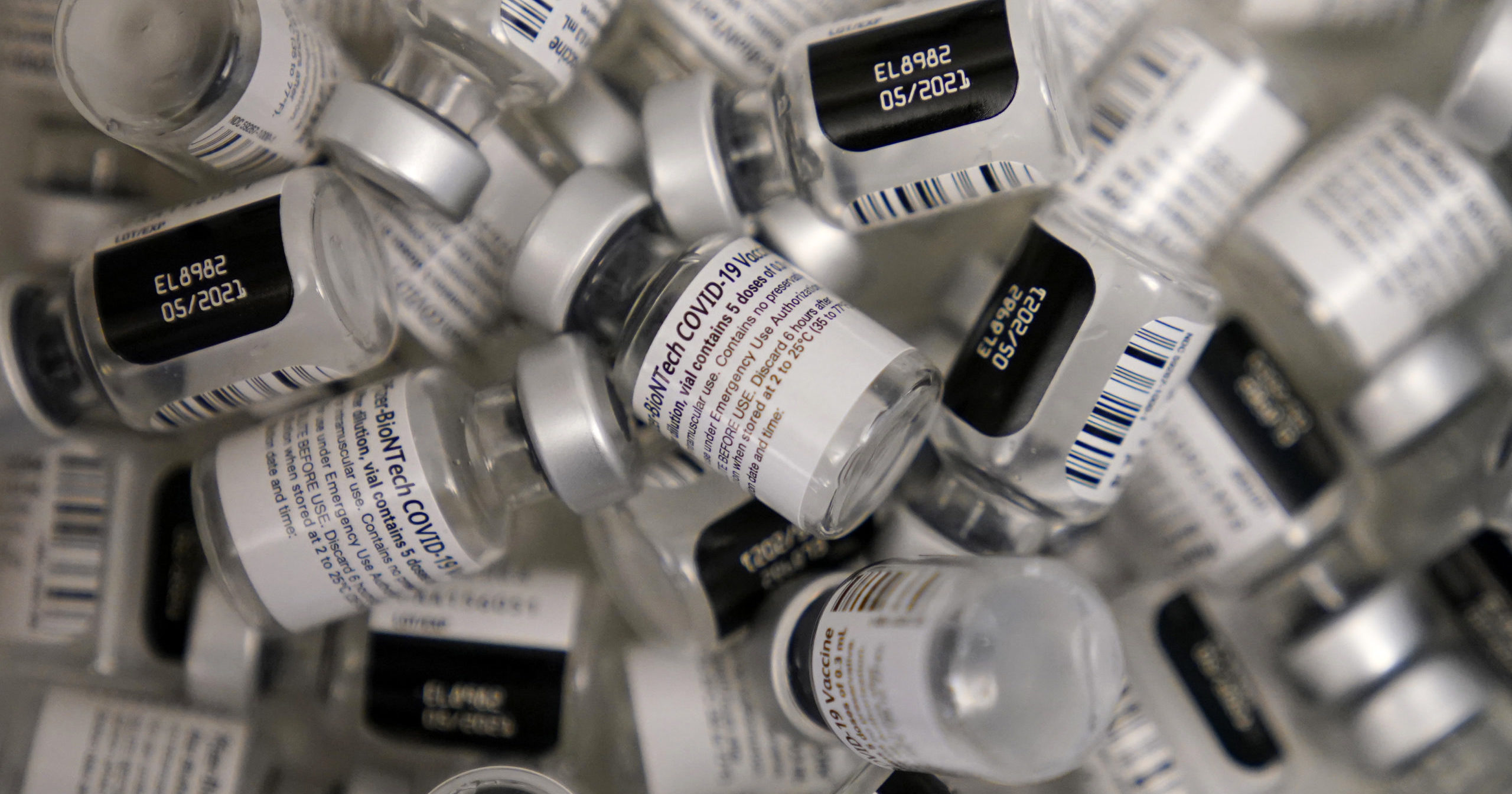 Empty vials of the Pfizer-BioNTech COVID-19 vaccine are seen at a vaccination center at the University of Nevada, Las Vegas, on Jan. 22.