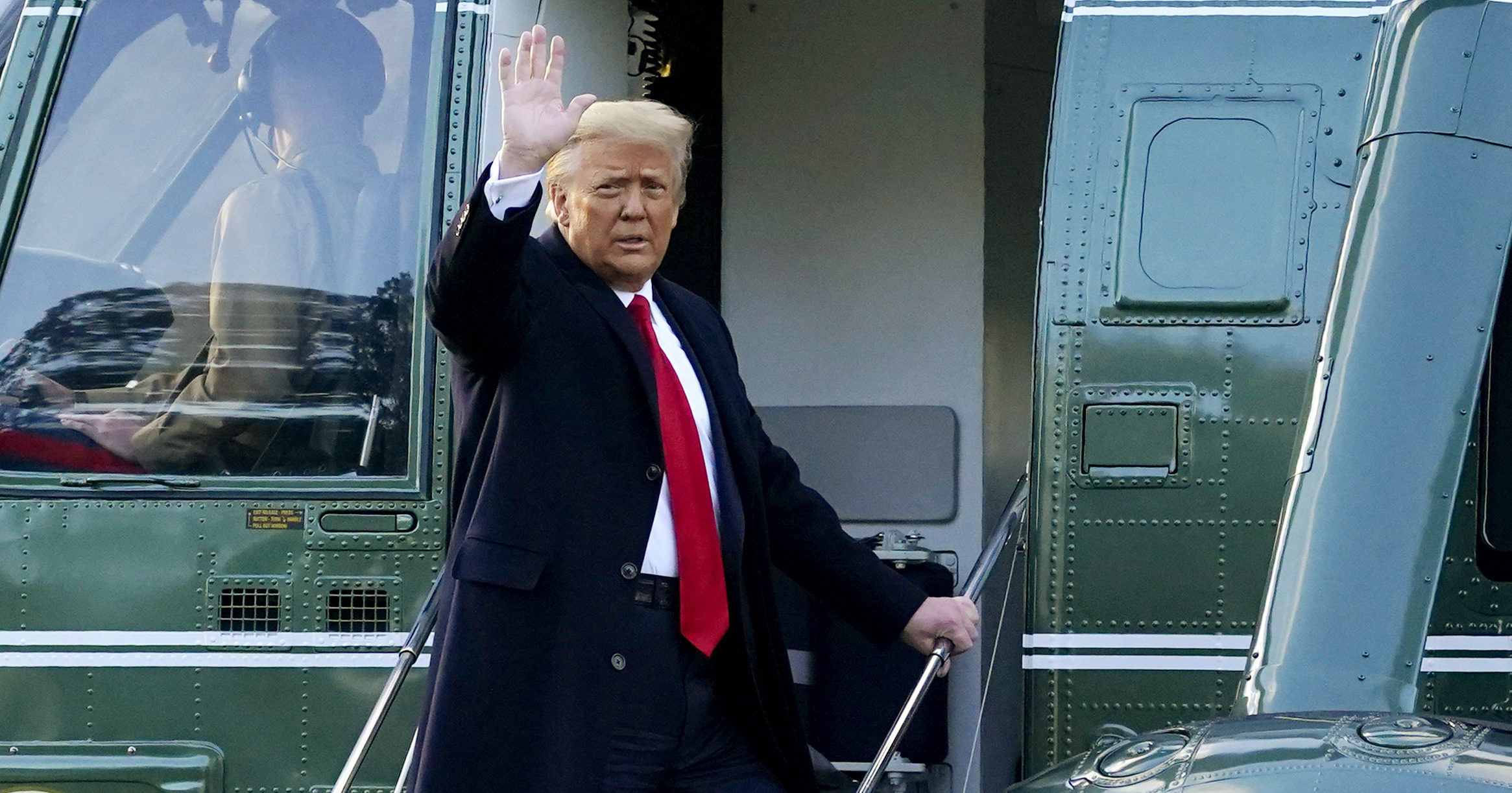 President Donald Trump waves as he boards Marine One on the South Lawn of the White House in Washington, D.C., on Jan. 20, 2021.