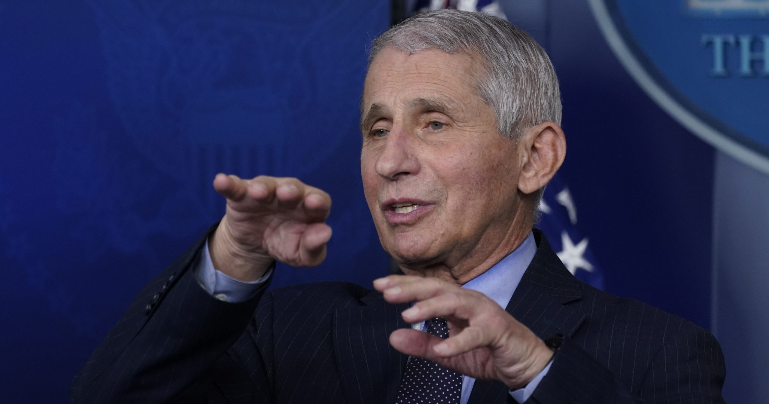 Dr. Anthony Fauci, director of the National Institute of Allergy and Infectious Diseases, speaks with reporters at the White House in Washington on Jan. 21.