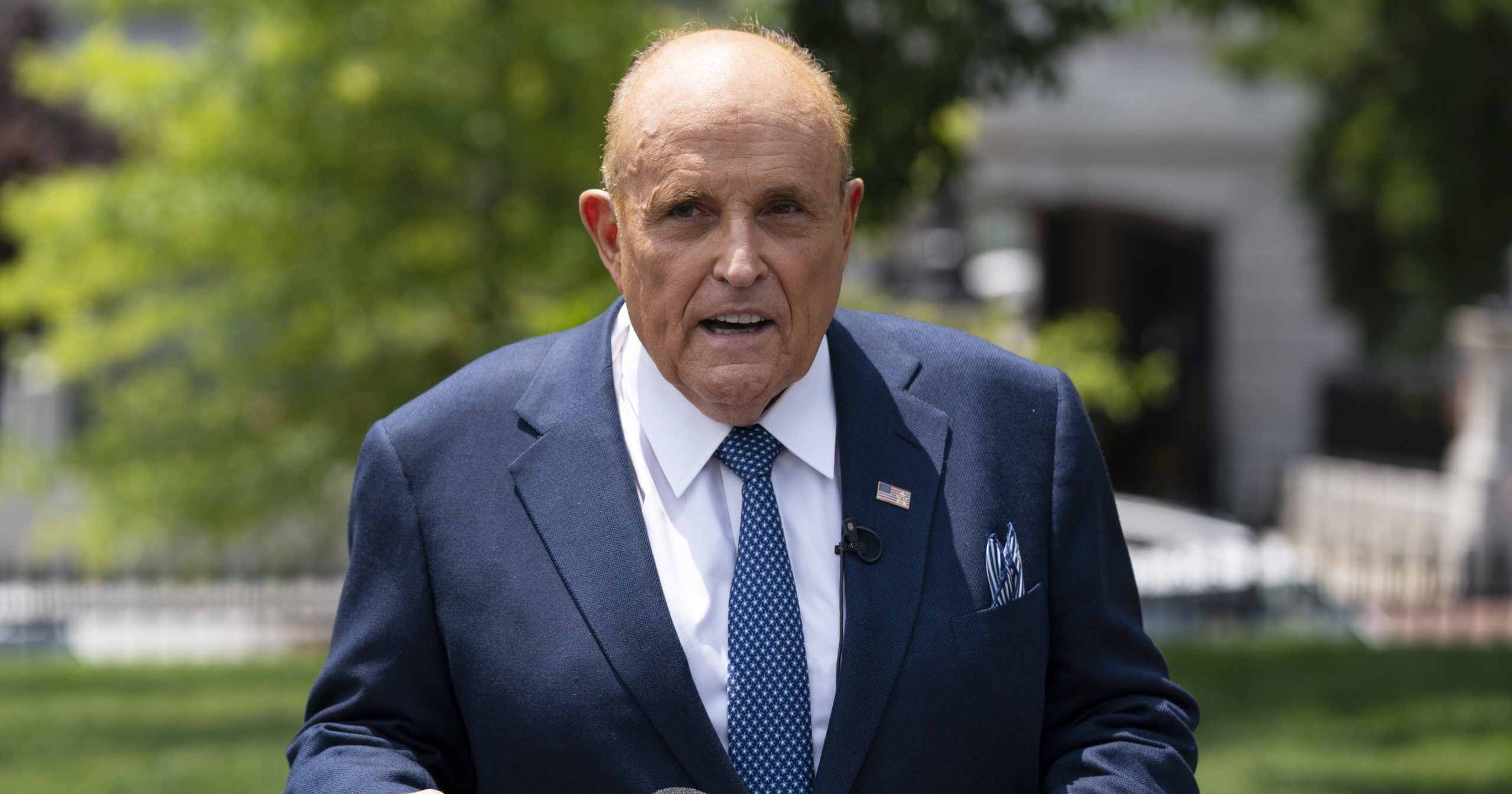 Rudy Giuliani talks with reporters outside the White House on July 1, 2020, in Washington, D.C.
