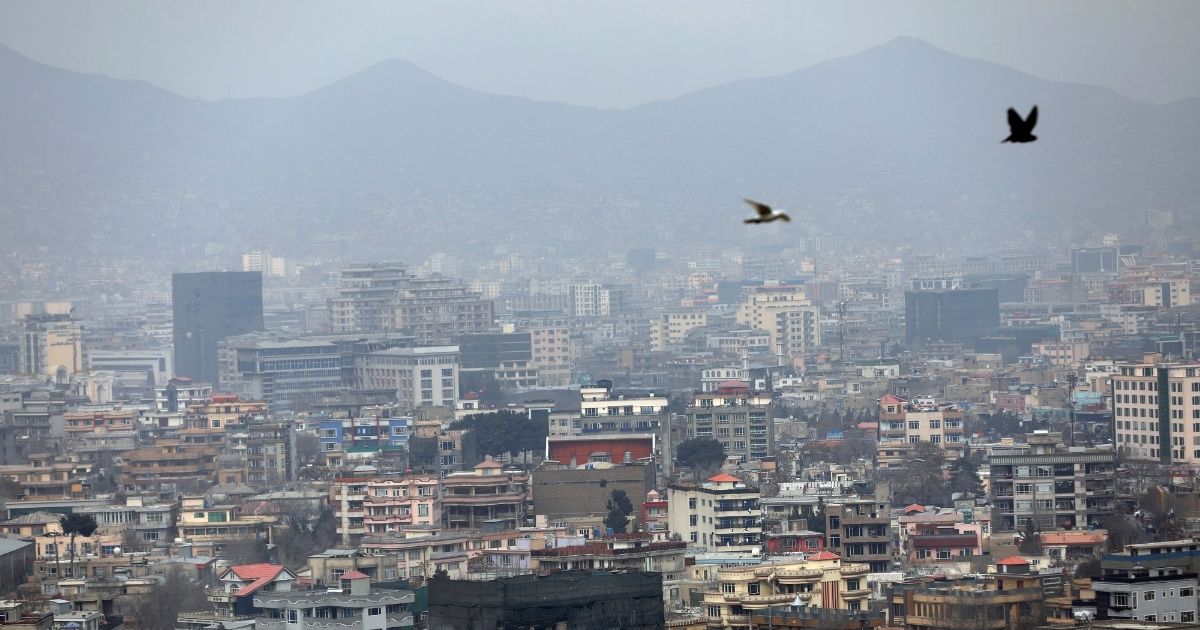 In this Feb. 1 file photo, birds flyover the city of Kabul, Afghanistan. The United States wasted billions of dollars in war-torn Afghanistan on buildings and vehicles that were either abandoned or destroyed, according to a report released Monday by the Special Inspector General for Afghanistan Reconstruction, a U.S. government watchdog.